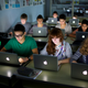 Pupils working at their laptops